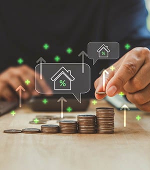 Business investor stacking coins with house and percentage icons, property investment, mortgage interest, financial growth, savings plan, real estate returns and long term wealth management strategy.
